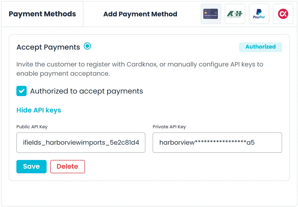 The Accept Payments panel on a customer's Payment tab in the RushHour Company Portal, with the status Authorized, Authorized to accept payments ticked and the API keys entered manually