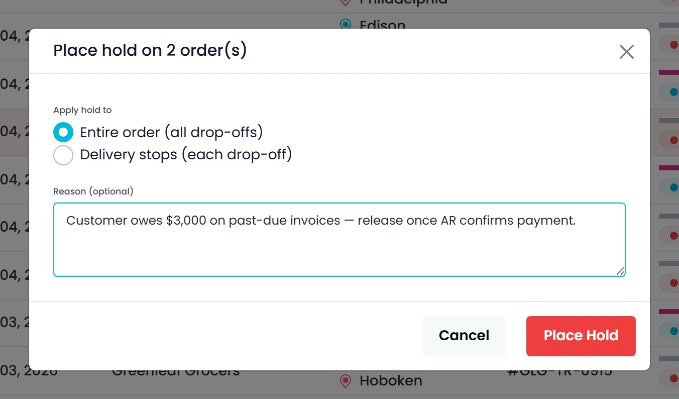 Place hold on 2 order(s) dialog opened from the Orders list, with Apply hold to set to the entire order or to each delivery stop, the optional reason 'Customer owes $3,000 on past-due invoices' and a Place Hold button
